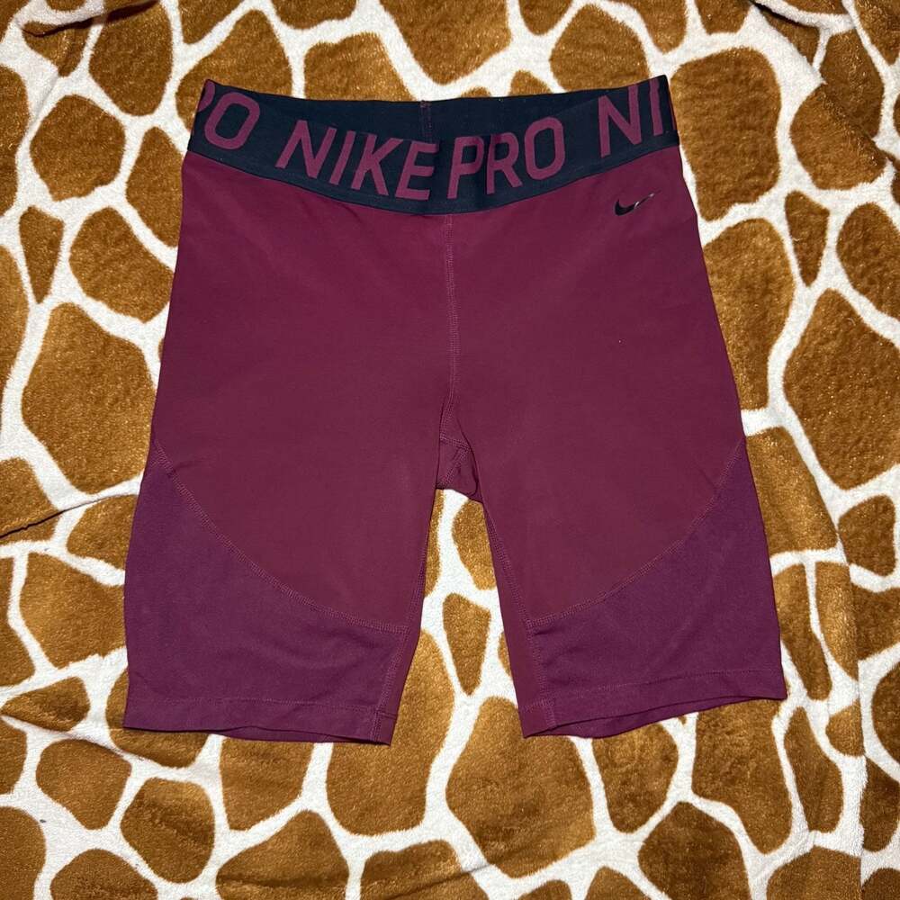Nike Pro Women's 7" Mid-Rise Training Shorts in Bordeaux AR6709-638